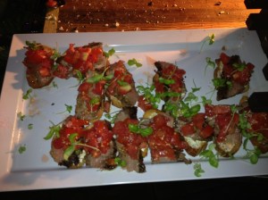 Dirty Grilled Flank Steak Bruschette with Jersey Tomato and Goat Cheese Spread w/ Micro Greens